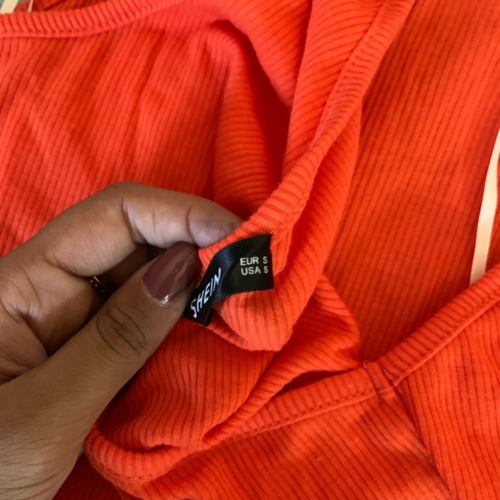 skin tight one shouldered orange dress